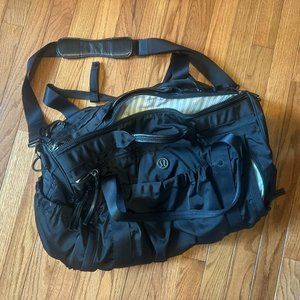 Like new lululemon duffle bag, tons of pockets, yoga mat carrier, shoe bag